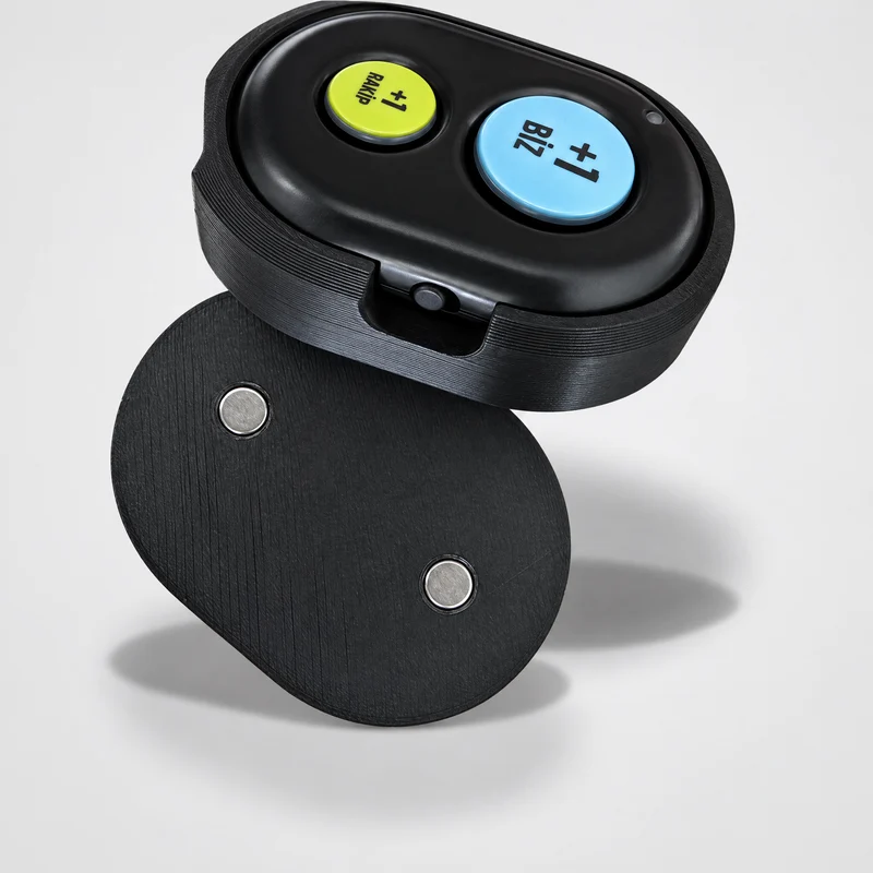 Telecomando Bluetooth magnetico Confezione singola: telecomando con tasti +1 Biz e +1 Rakip in un supporto magnetico nero